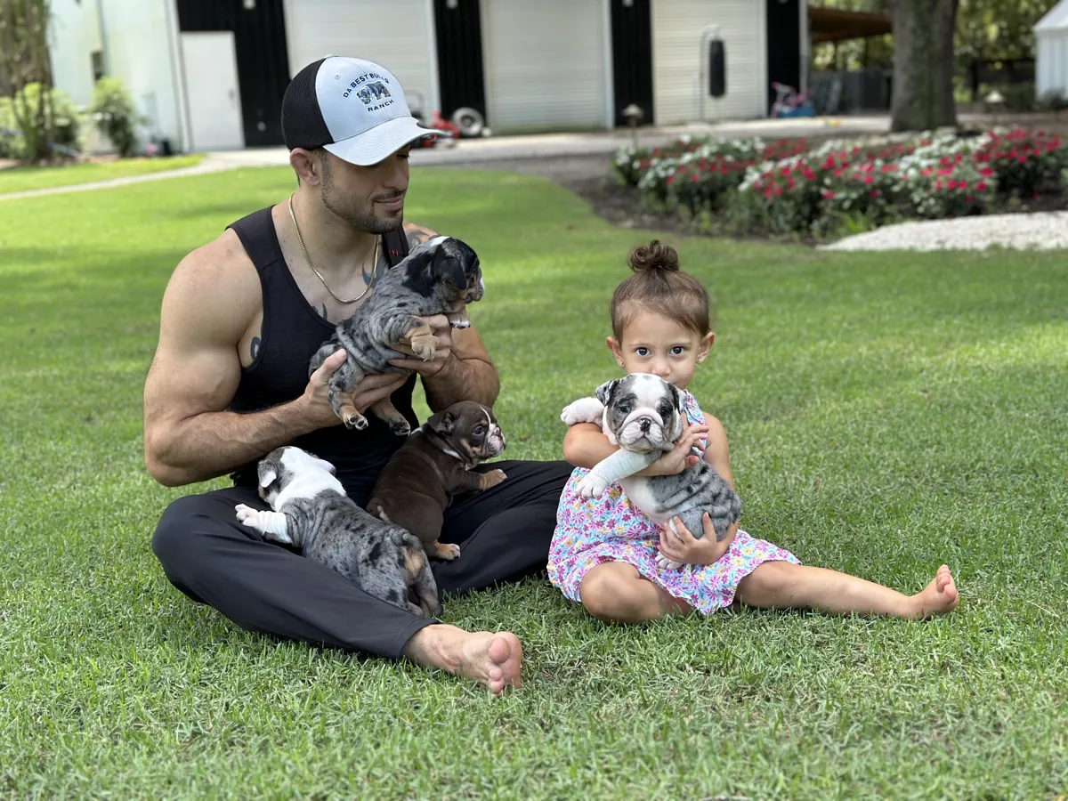 Jason Soares with English bulldog puppies at DaBestBulls Ranch