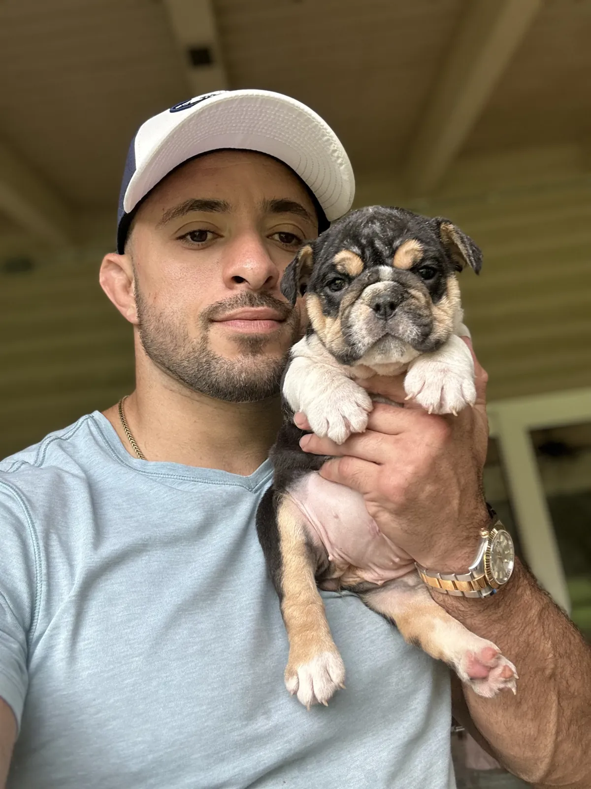 Jason Soares with English bulldog puppies at DaBestBulls Ranch